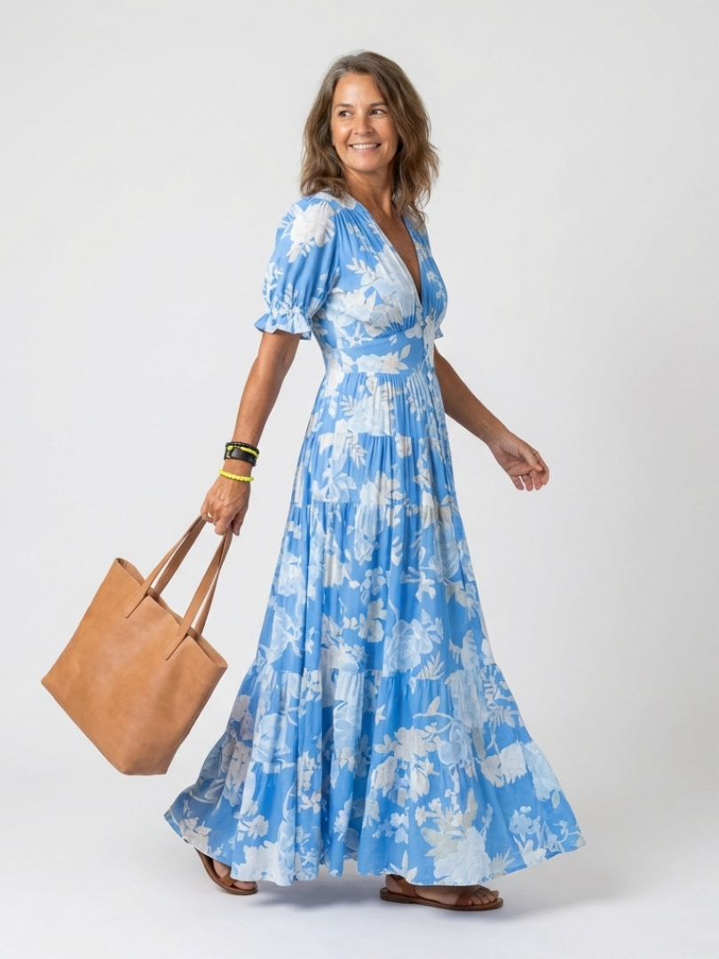 Ione | Abito midi floreale senza maniche